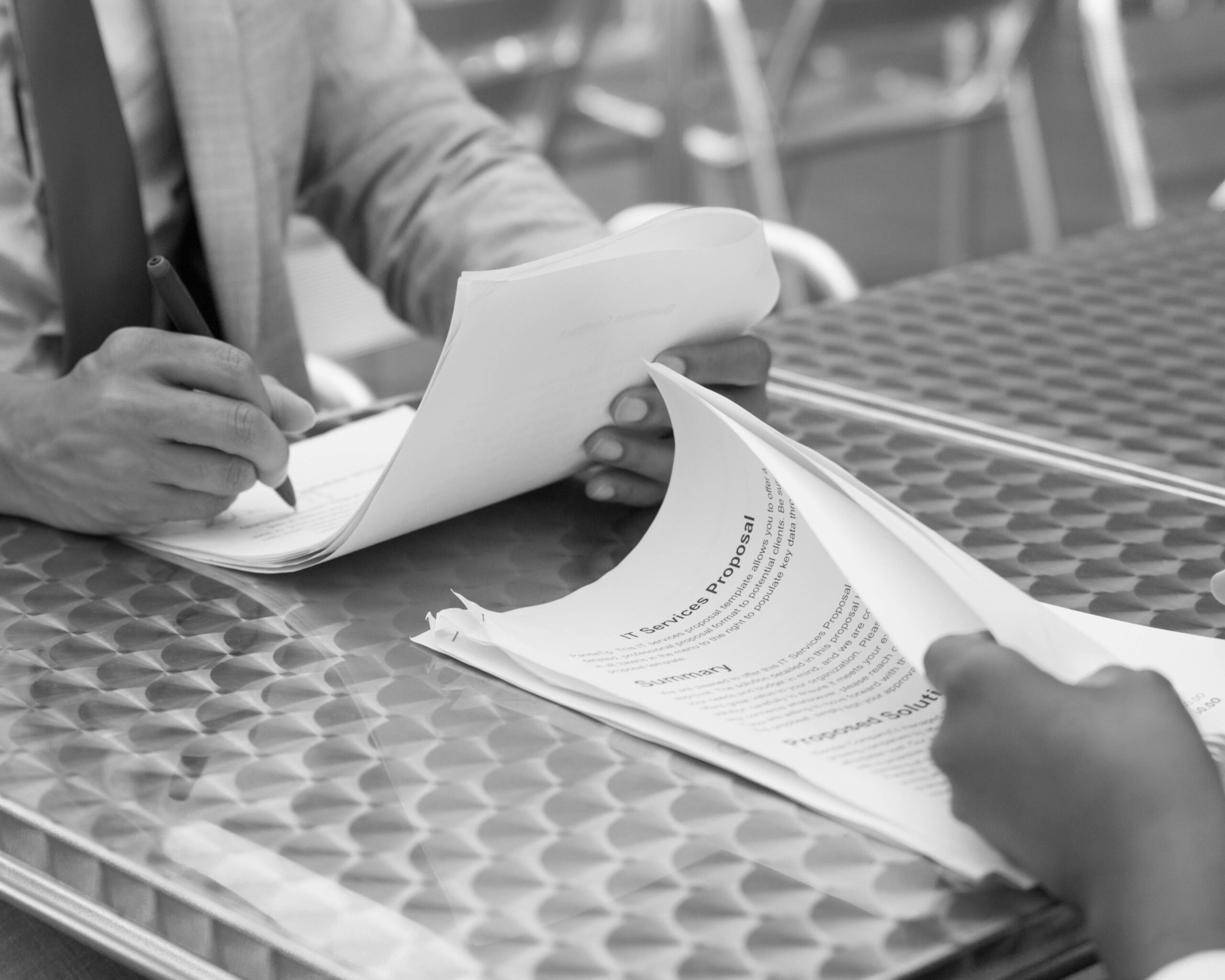 business partners checking signing document 1 scaled